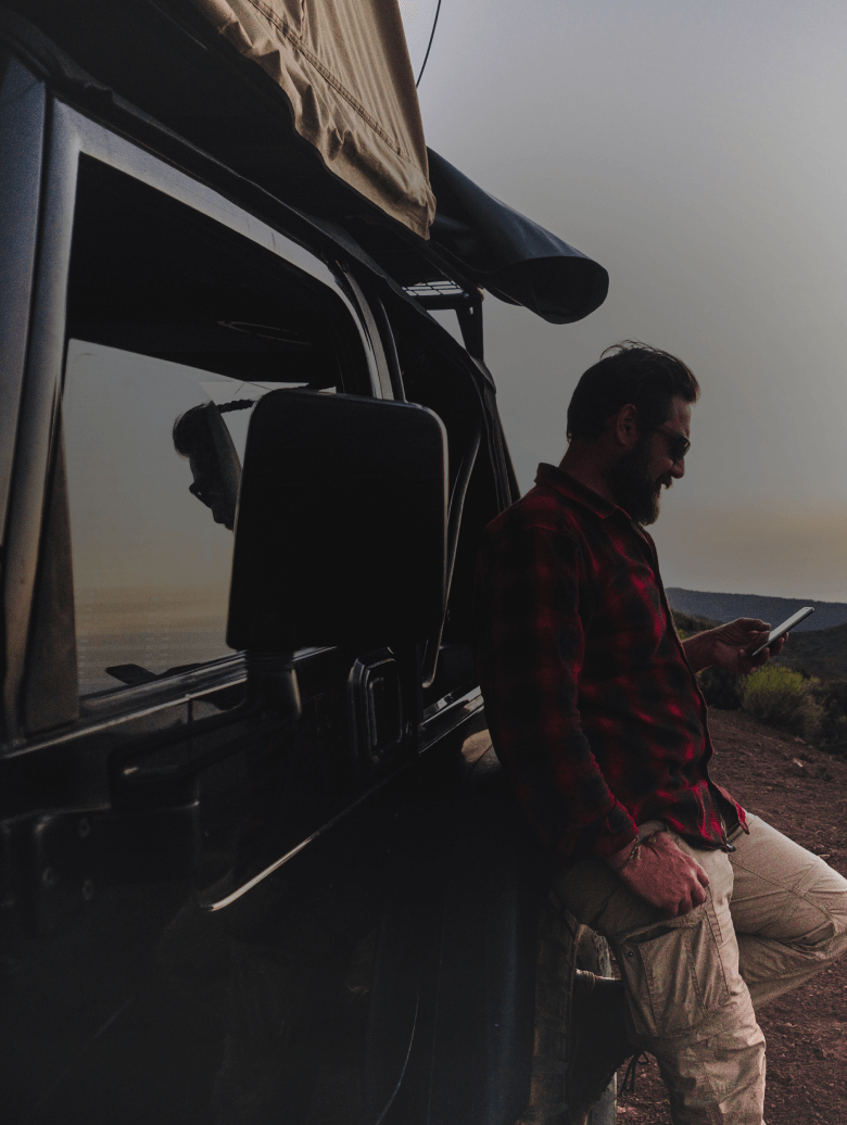 B2C & B2B success story - Man standing in front of REDARC vehicle